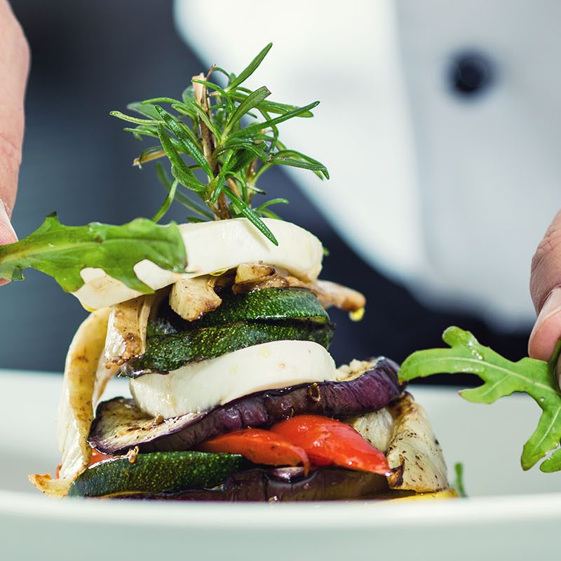 A chef plating up