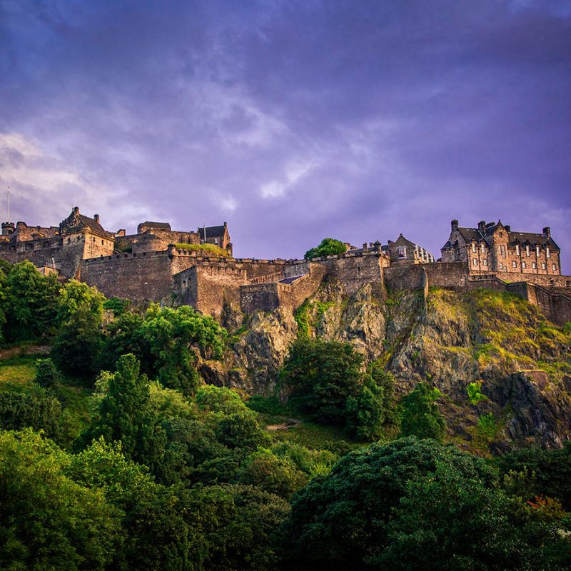 Edinburgh Castle with a dramatic sky behind it