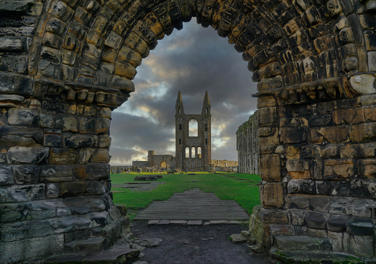 The ruins of St Andrews Cathedral and its graveyard in St Andrews Scotland