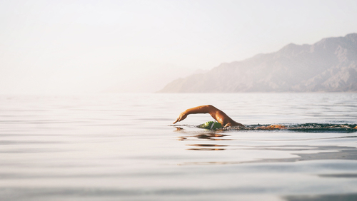 Person swimming in the sea