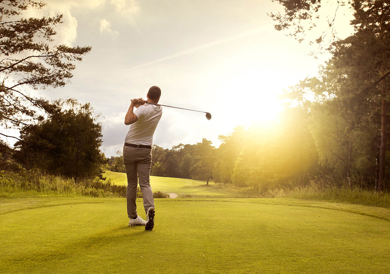 A golfer taking a swing