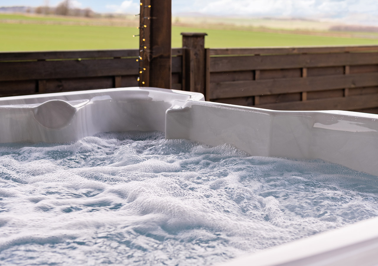 The hot tub at Lodge 3 at Elderburn Luxury Lodges