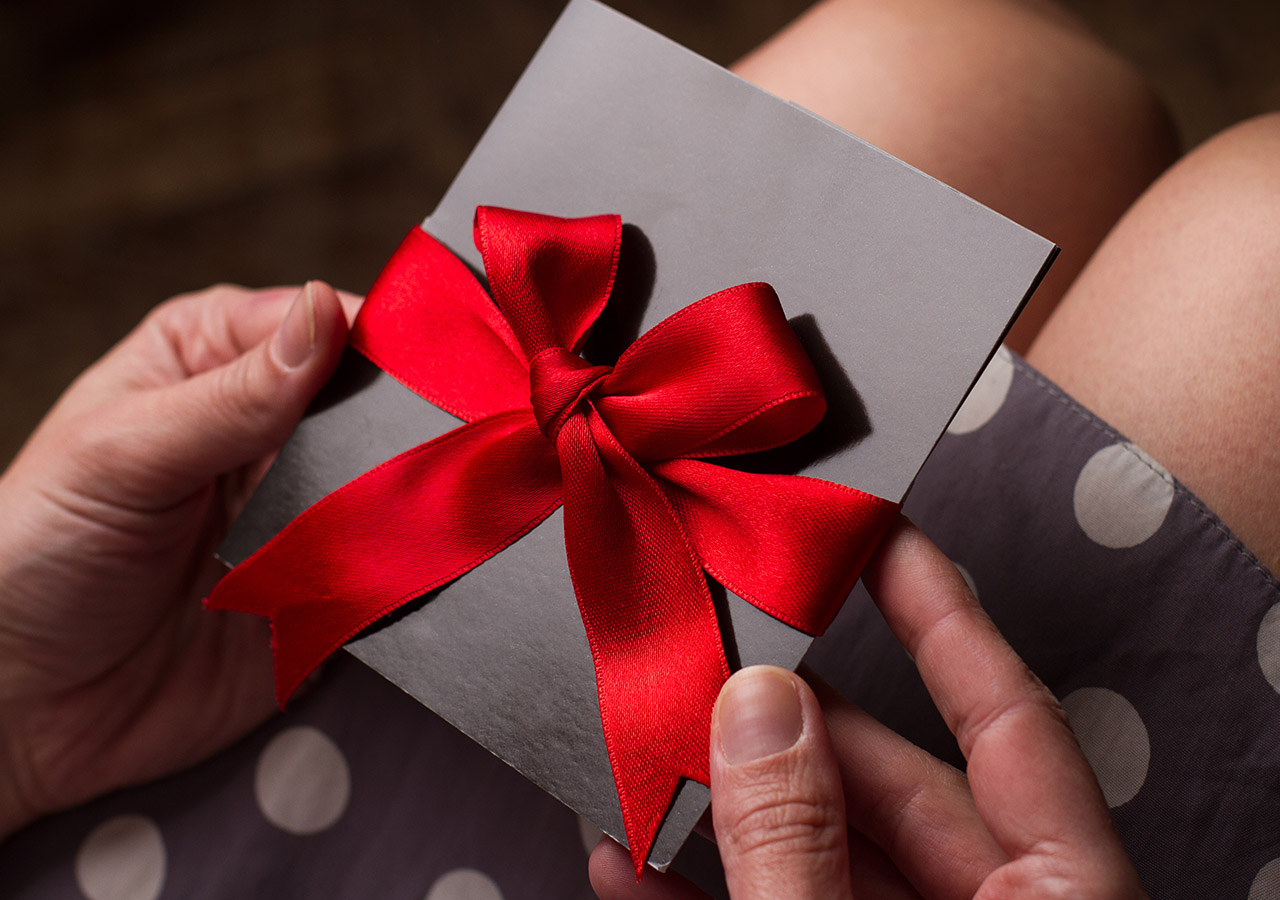 A gift card about to be opened my someone