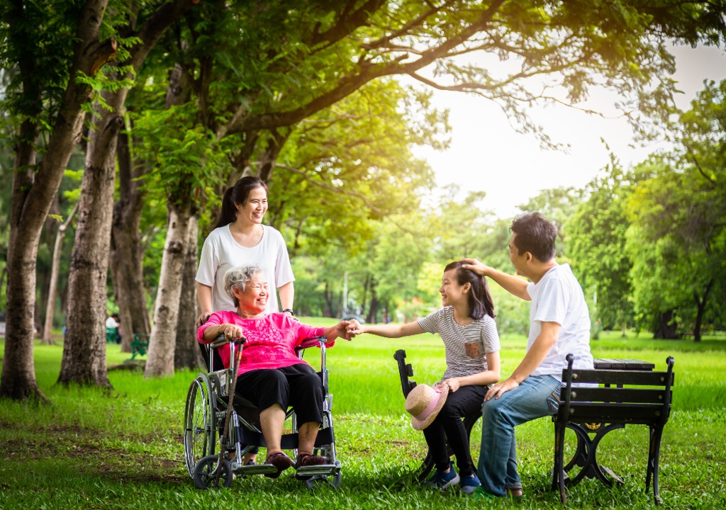 Family on holiday with person in a wheelchair