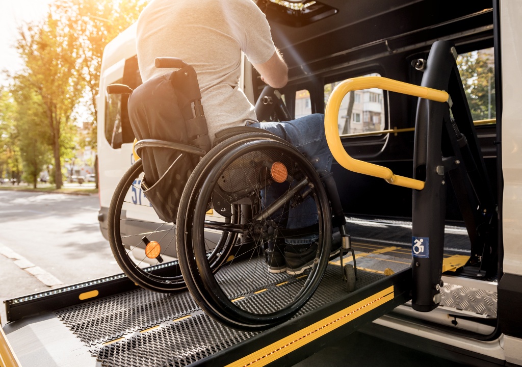 Wheelchair accessible taxis helping someone in a wheelchair get around