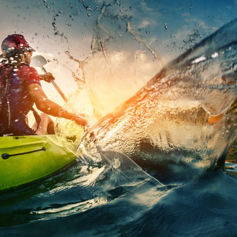 Making splashes in the water on a kayaking experience