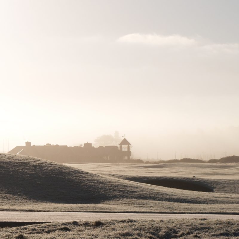 St Andrews old course covered in snow on a misty morning