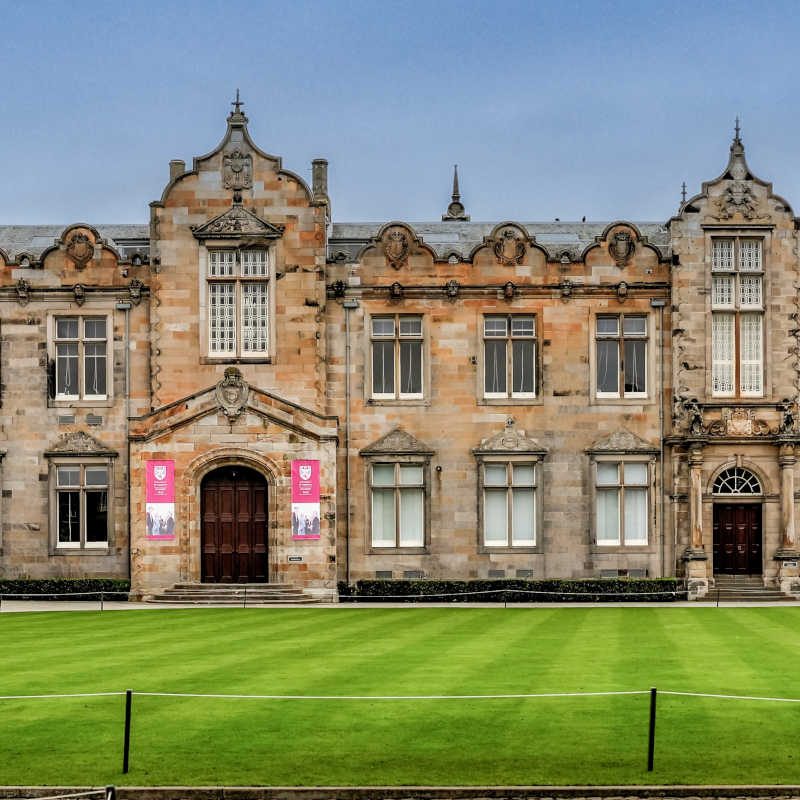 The iconic buildings and grass fields of the quadrangle at the University of St Andrews in Scotland